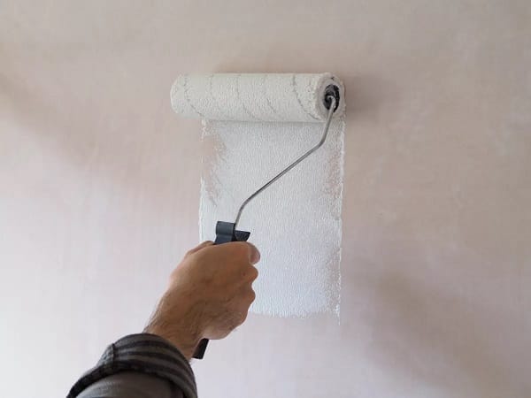 how to paint fresh plaster walls